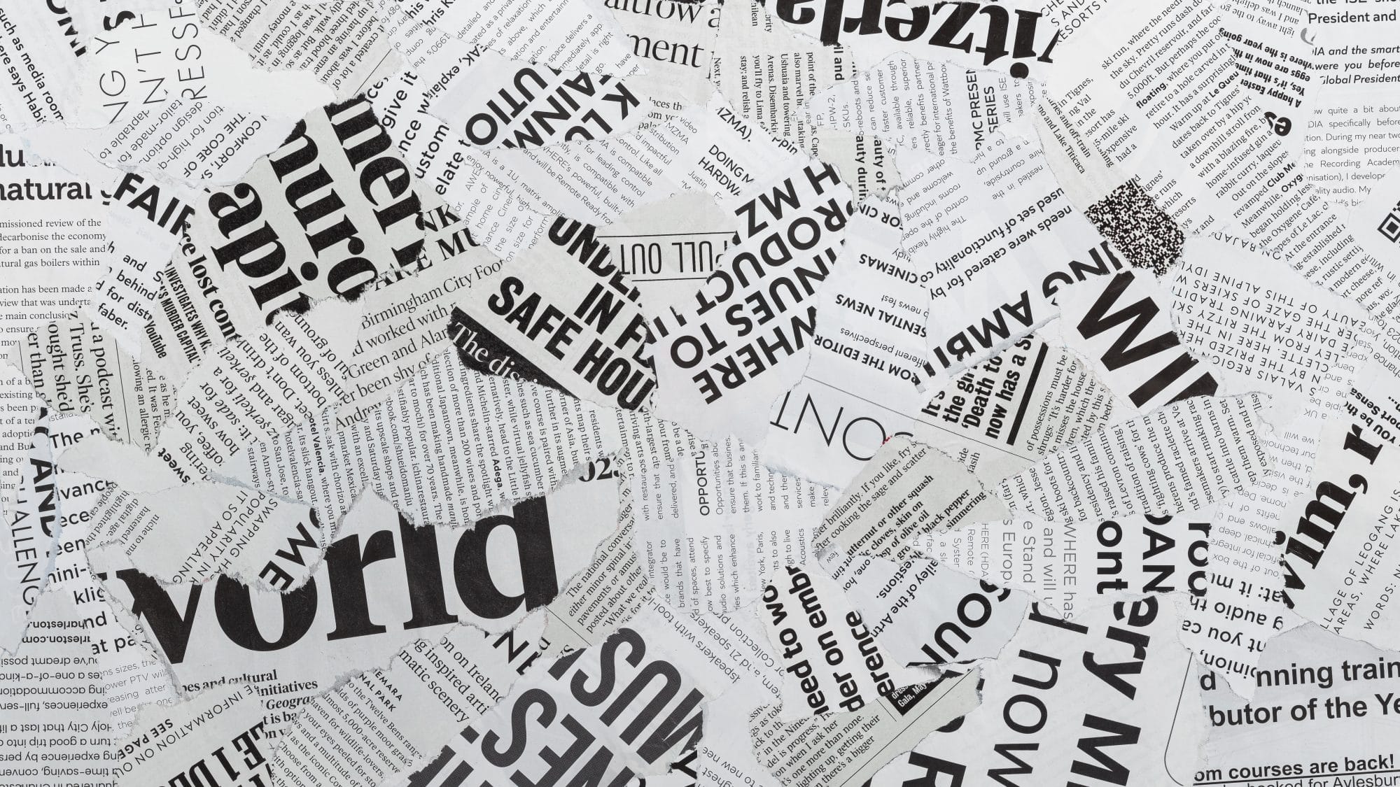 torn pieces of news paper